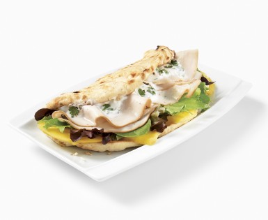 Pita à la mangue et dinde tranchée