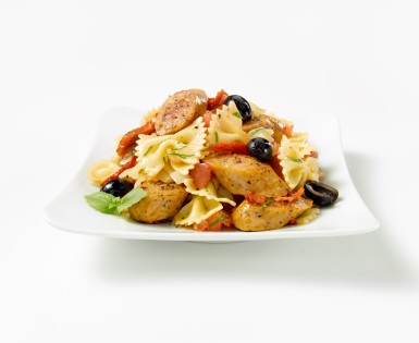 Pasta sauteed with sausage and tapenade