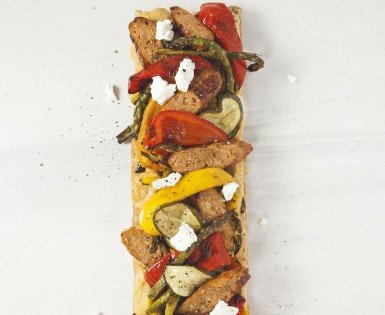 Puff pastry with hummus, vegetables, Italian sausage and  fresh goat cheese