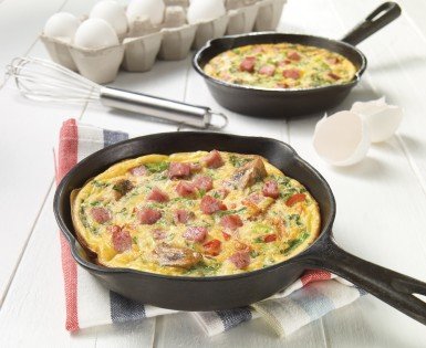 Frittata with salami, vegetables and herbs