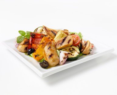 Warm salad with sausages, grilled vegetables and artichokes